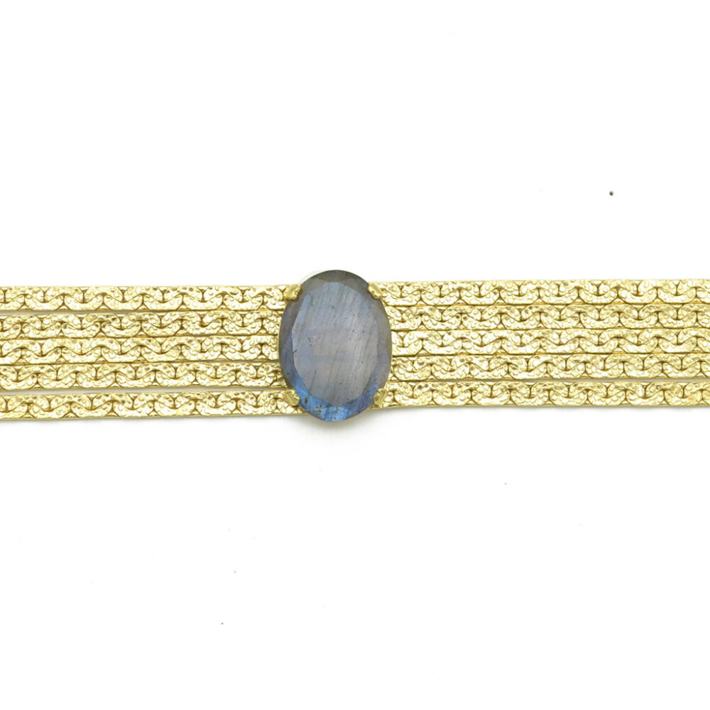 Bracelet manchette orné d'une pierre ovale